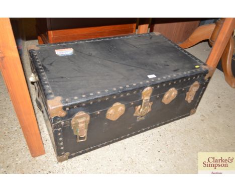 A metal bound travelling trunk