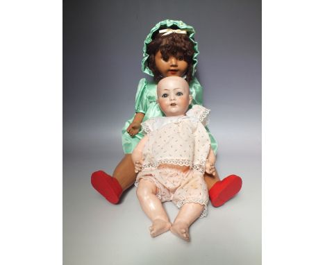 A HEUBACH KOPPELSDORF VINTAGE HARD PLASTIC DOLL, overall H 60 cm, together with a Heubach Koppelsdorf bisque headed doll H 32