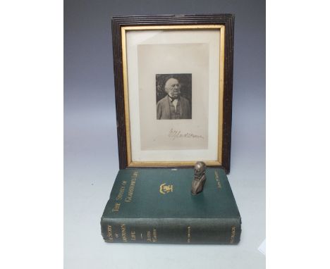 A VICTORIAN NOVELTY VESTA MODELLED AS A HEAD AND SHOULDER PORTRAIT OF W.E. GLADSTONE, together with a book on 'The Story of G