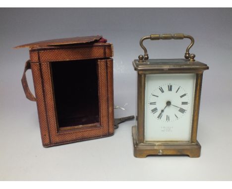 A FRENCH BRASS CASED CARRIAGE CLOCK WITH CARRY CASE, the enamel dial with Roman numerals, marked J. Boseck & Co., Calcutta, M