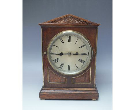 AN OAK CASED DOUBLE FUSEE THREE QUARTER WESTMINSTER STRIKE BRACKET CLOCK ON FIVE GONGS, the architectural case with sectional