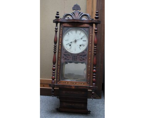 AN AMERICAN INLAID WATERFALL WALL CLOCK, the enamel dial with Roman numerals, pierced fretwork carved detail, H 93 cm  S/D
