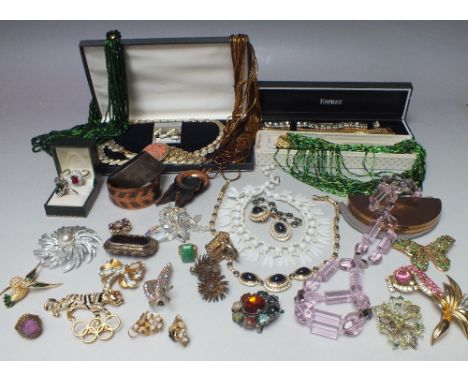 A COLLECTION OF MOSTLY VINTAGE COSTUME JEWELLERY, comprising a selection of bead necklaces, brooches, rings and earrings etc.