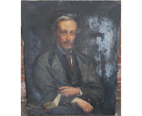 R.B. PAUL. A late 19th / early 20th century portrait study of a seated gentleman holding a book, signed and inscribed lower r