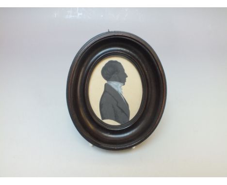 A 19TH CENTURY STYLE PORTRAIT SILHOUETTE OF A GENTLEMAN, framed and glazed, overall H 14 cm