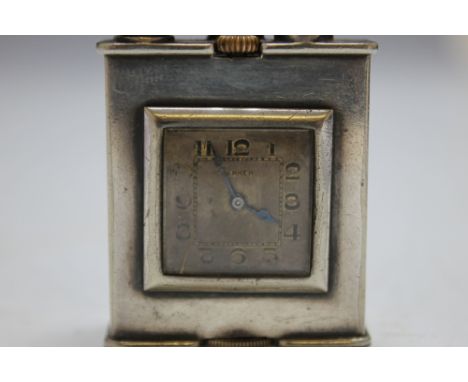 A VINTAGE PARKER 'BEACON' WHITE METAL LIGHTER WITH INSET CLOCK, H 5 cm