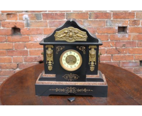 A HEAVY VICTORIAN SLATE MAUSOLEUM MANTEL CLOCK, having enamel dial, the case decorated with gilt metal mounts and detail, H 5
