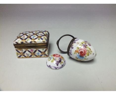 A STAFFORDSHIRE ENAMEL EGG SHAPED BONBONNIERE, with scrolling and foliate decoration, H 5 cm, together with a Continental ena