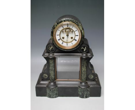 A LARGE 19TH CENTURY BLACK MARBLE PORTICO STYLE MANTEL CLOCK, having enamel dial, coloured marble panels and half columns to 