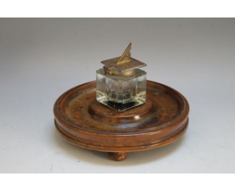 AN UNUSUAL SUNDIAL MOUNT INKWELL, on turned wooden base, Dia 14.25 cm