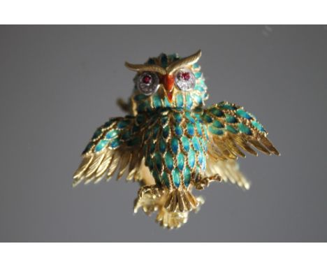 A ENAMEL RUBY AND DIAMOND OWL BROOCH, possibly by Faberge, a comical owl with outstretched wings, each short feather being in