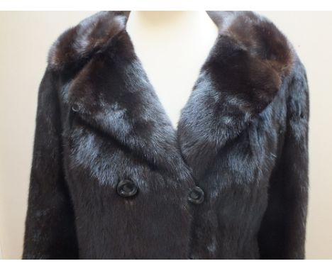 A LADIES VINTAGE DARK BROWN MINK FUR JACKET, fully lined, button and hook fastening, front pocketsCondition Report:No obvious