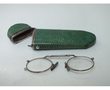 A VINTAGE SHAGREEN SPECTACLE CASE WITH WHITE METAL MOUNTS, the hinged lid with engraved white metal cartouche to top edge, co