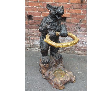 AN UNUSUAL RESIN BLACK FOREST STANDING BEAR STICK STAND, standing on a rocky outcrop, H 98 cm