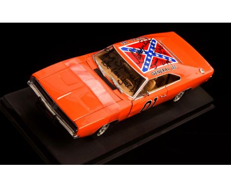 General Lee 1969 Dodge Charger Die cast model, signed by Catherine Bach who plays Daisy Duke in the television series The Duk