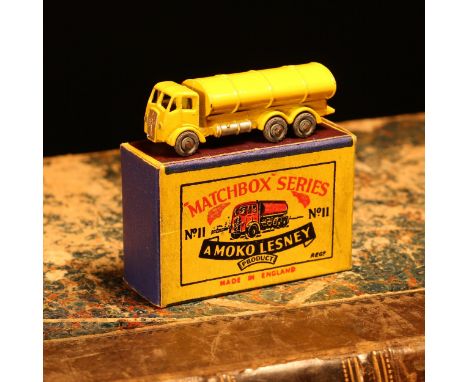 Matchbox '1-75' series diecast model 11a E.R.F. road tanker, yellow cab and body, silver grille, unpainted metal wheels, boxe