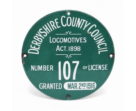 Derbyshire Interest - a single sided circular enamel license plate, white lettering on a green ground 'DERBYSHIRE COUNTY COUN
