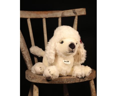 Steiff (Germany) EAN 079481 Pauline Poodle, trademark 'Steiff' button to ear with yellow and red tag, circular cardboard ches