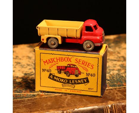 Matchbox '1-75' series diecast model 40a Bedford 7-ton tipper, red cab with silver grille, beige/tan tipper piece, unpainted 