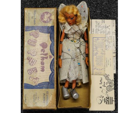 A 1950's Pelham Puppet SL wire winged Fairy, from the SL Range, solid head, blonde faux wavy hair, painted features including