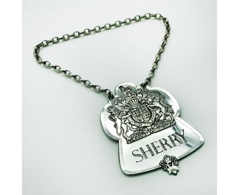 LIMITED EDITION SILVER JUBILEE SHERRY DECANTER LABEL, ROBERTS & BELK LTD 1977Weight: 32gSize: 6cm x 4.5cm