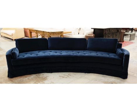 SOFA, of curved form Hollywood Regency style, recently reupholstered in sapphire blue velvet fabric by Roma Forenza, 286cm W 
