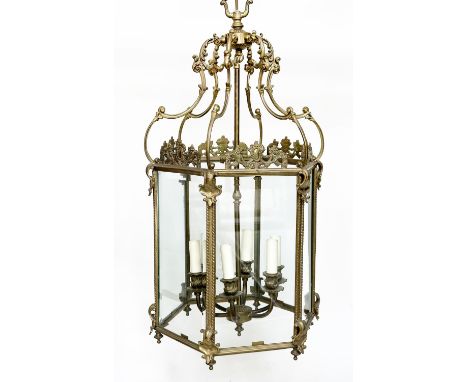 HALL LANTERN, Georgian style gilt metal hexagonal glazed with crests, 'C' scroll mounts and 6-light candelabra, 75cm H x 43cm