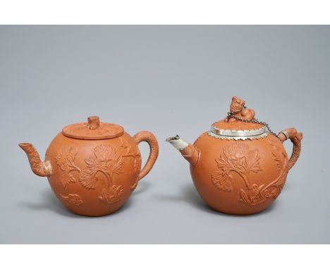 Two Chinese Yixing stoneware teapots with applied floral design, Kangxi H.: 10,5 cm - L.: 15 cm (the largest) We have more lo