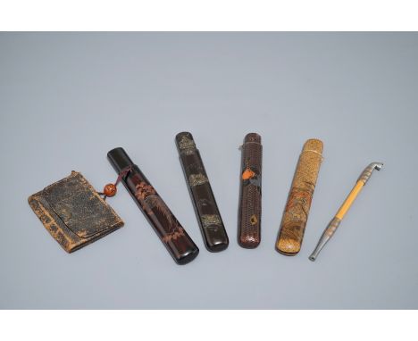 Four Japanese kiseru or tobacco pipe cases, a pipe and a pouch, Meiji, 19th C. L.: 22 cm (the largest)  Provenance: A Belgian