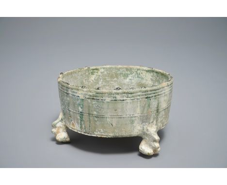 A Chinese green-glazed pottery tripod censer, Han H.: 10,5 cm - Dia 18,5 cm  Provenance: Acquired from Spink & Son, Ltd., Lon
