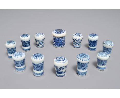 Twelve Chinese blue and white cane handles or scroll painting ends, 18th C. and later H.: 5 cm (the tallest) We have more lot