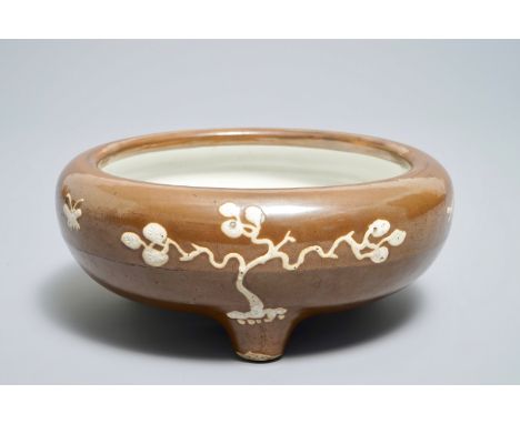 A Chinese slip-decorated brown-glazed tripod censer, Chenghua mark, Ming Dia.: 21,5 cm - H.: 9 cm  Provenance: With a label o