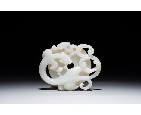 A Chinese white jade carving of a dragon on a bi-disc, 20th C. Dim.: 7,5 x 5,5 x 1 cm We have more lots available exclusively