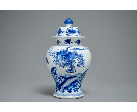 A Chinese blue and white vase and cover with mythical beasts, Kangxi H.: 45,5 cm  Provenance: The collection of a French lady