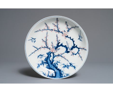 A Chinese blue, white and underglaze red dish, Xuande mark, Kangxi Dia.: 26,5 cm We have more lots available exclusively on o