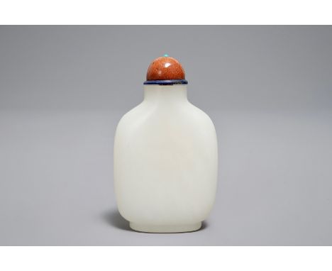 A Chinese white jade snuff bottle with goldstone stopper, 19/20th C. H.: 7,5 cm We have more lots available exclusively on ou