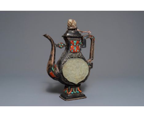 A silver-plated coral, jade and turquoise inlaid ewer and cover, Tibet or Mongolia, 19/20th C. H.: 35 cm - L.: 24 cm We have 
