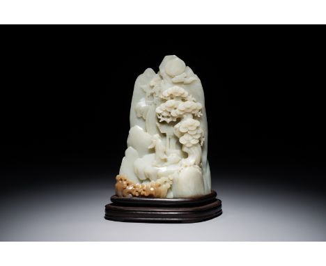 A Chinese jade carving of a mountain landscape, 20th C. H.: 13,5 cm (the jade incl. stand) We have more lots available exclus