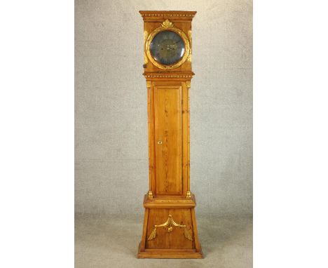 A 20th century Danish Bornholm style pine cased longcase clock, the brass and silvered dial with black Roman numerals and twi