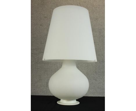 A contemporary white glass three light baluster shaped table lamp. H.80 Dia. 50cm. 