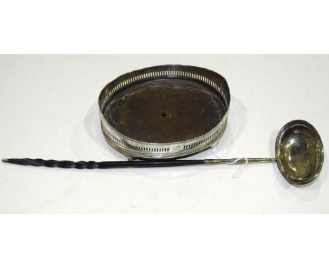 A George III silver punch ladle with baleen twist handle, London 1819, and an oval pierced silver cruet stand, marks rubbed, 