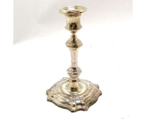 Silver candlestick by William Hutton &amp; Sons Ltd - 18.5cm high and has loaded base and has slight kink and rubbed marks 