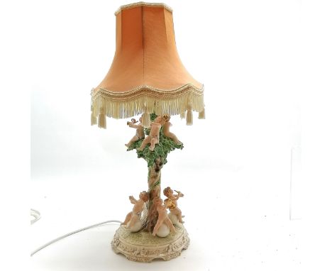 Capodimonte lamp base decorated with putti playing musical instruments, base 41cm high + shade - some small losses
