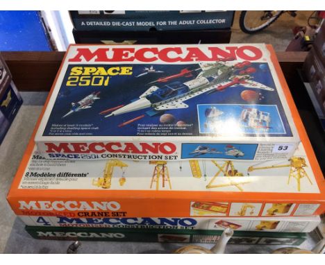 Boxed 'Meccano Space 2501 Construction Set', a 'Motorised Set', a 'Motorised Crane Set' and an 'Army Set', all unopened