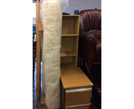 A light wood three quarter bed frame and mattress