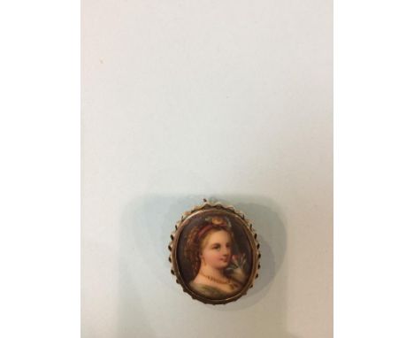A miniature portrait, mounted in a 9ct gold brooch, 15g total