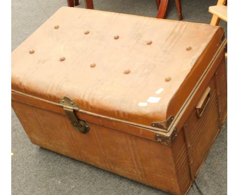 An early 20thC tin trunk of rectangular form.