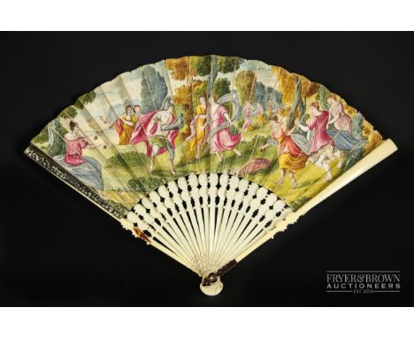 An 18th century fan with ivory sticks & guards, the leaves painted with an all over scene of a Greek warrior with various mai