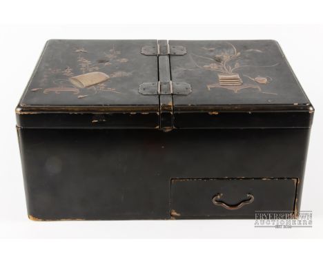 A Japanese lacquer tea chest and double caddy with single drawer beneath, decorated with Japonesque motifs of tables with imp