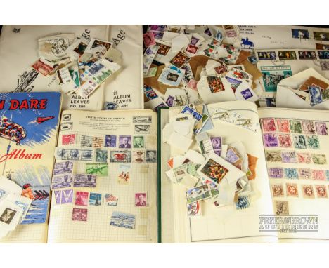 World and Great Britain stamps in two albums, sparse, and envelope, few GB First Day Covers, two empty albums, and some stamp